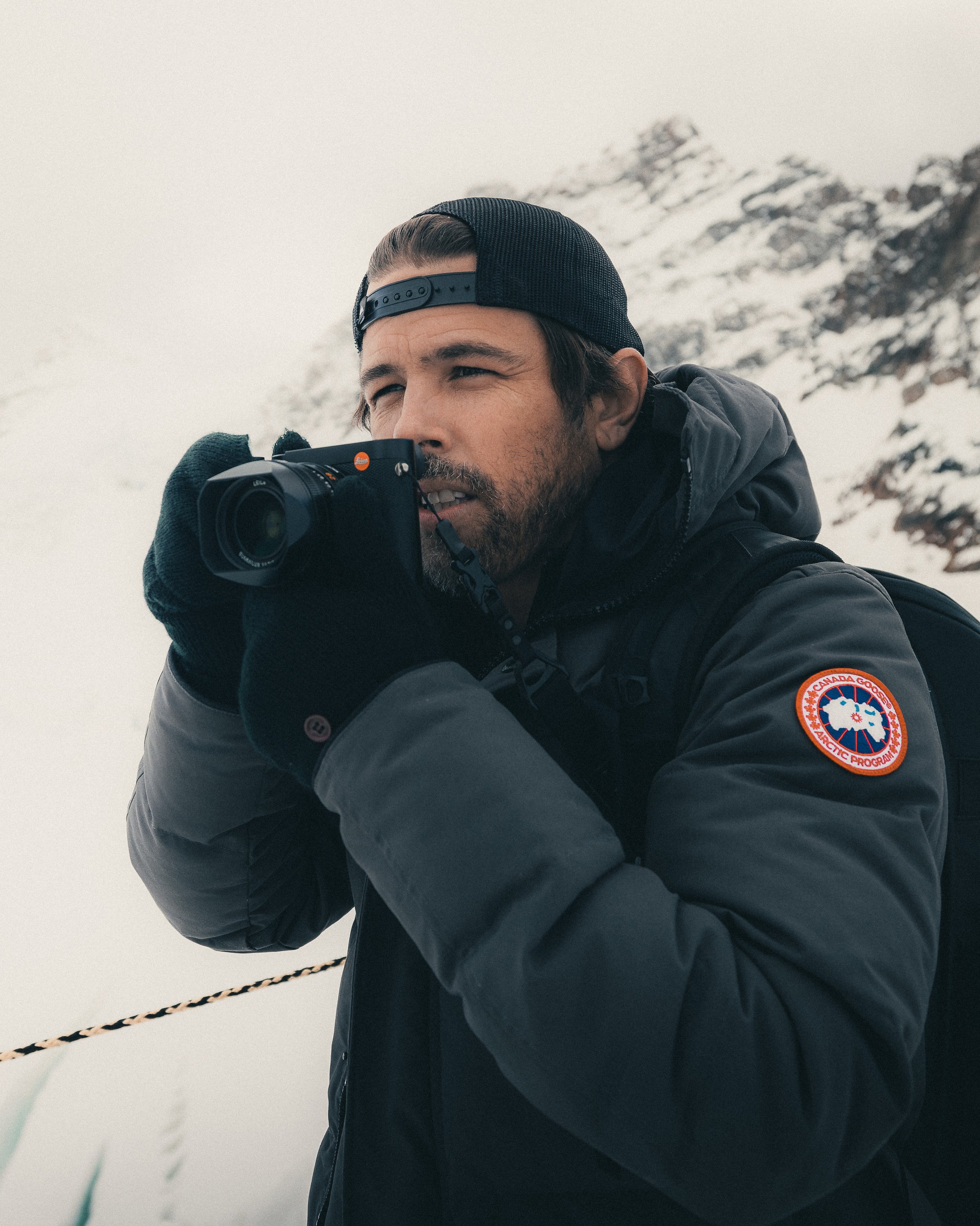 Caleb Spillyards on location, shooting on a Leica